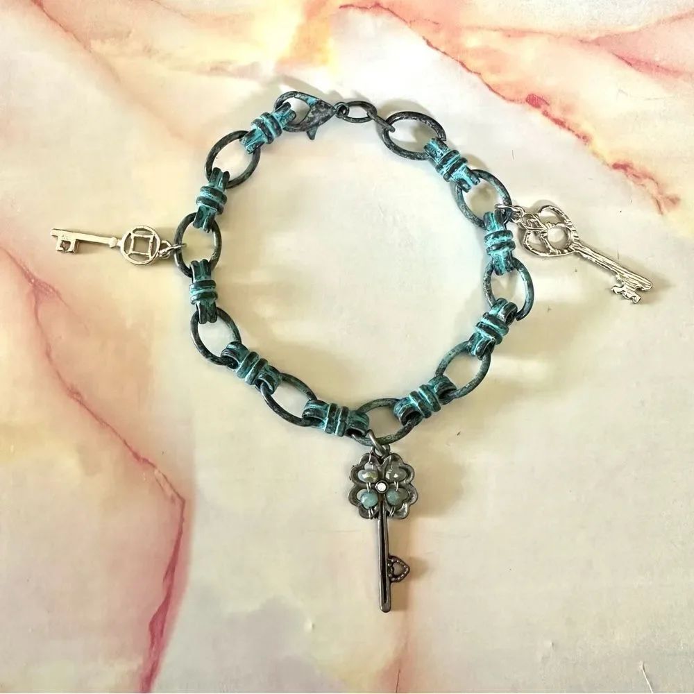 Blue metal key charm bracelet